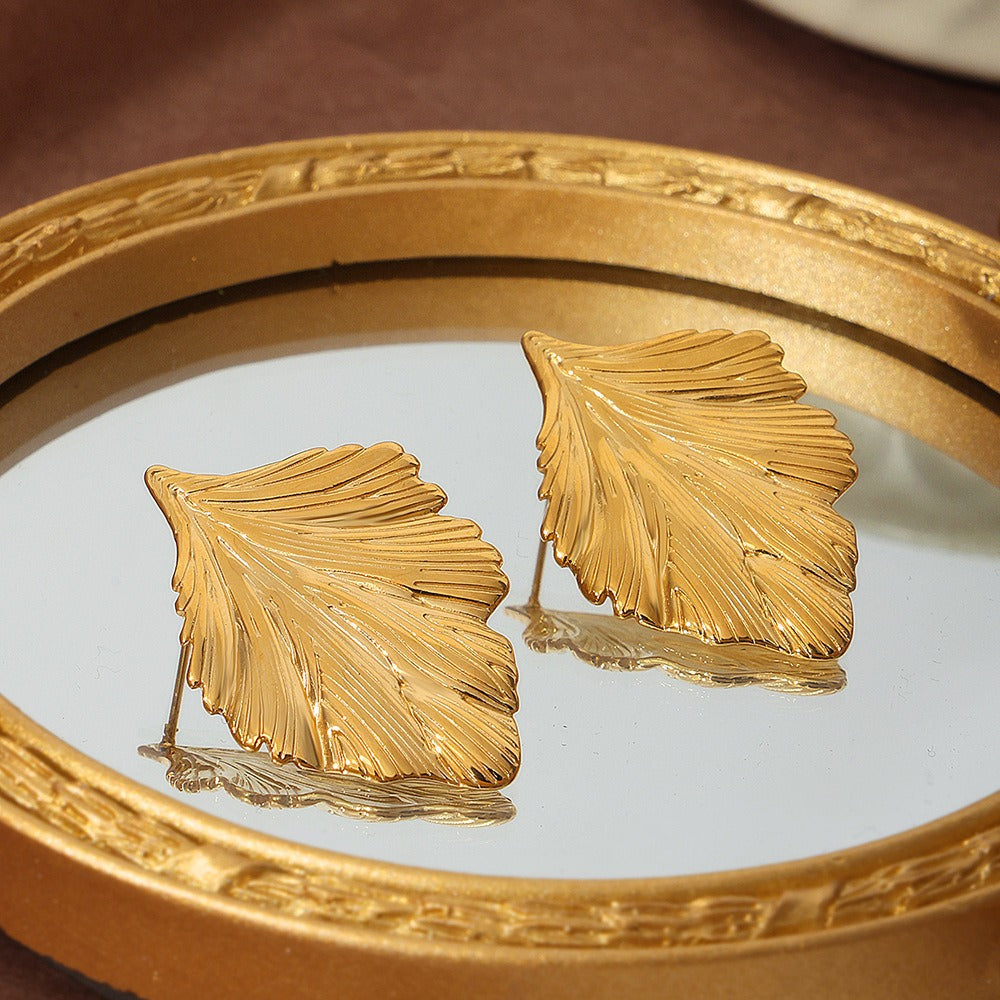 Lumora Golden Leaf Textured Statement Earrings