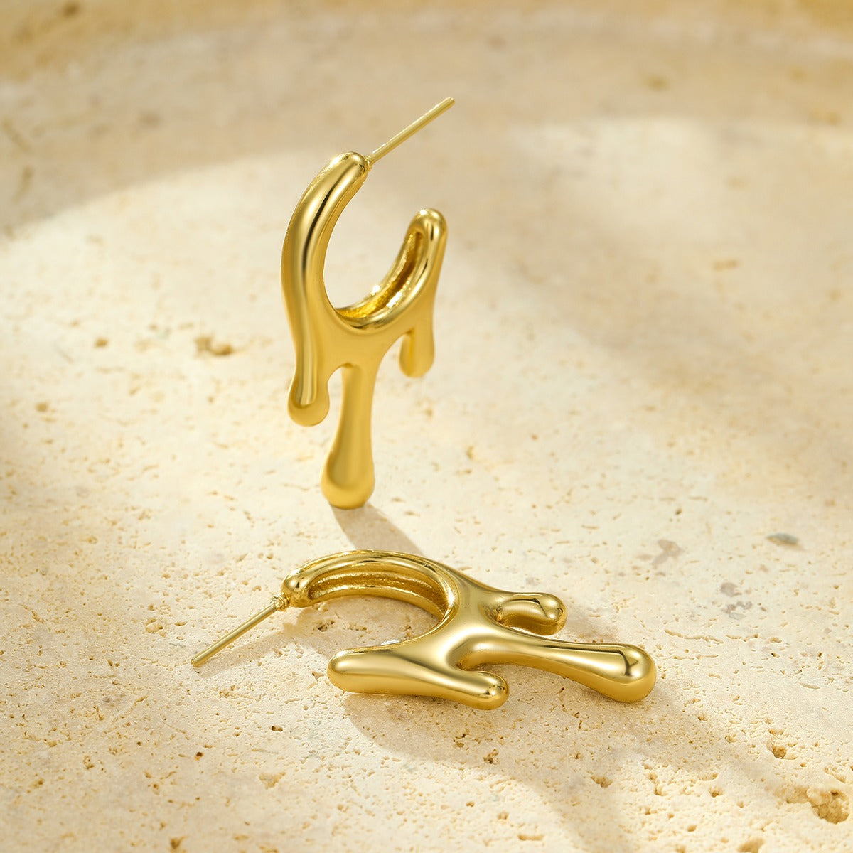 Lumora Golden Fluid Drip Earrings