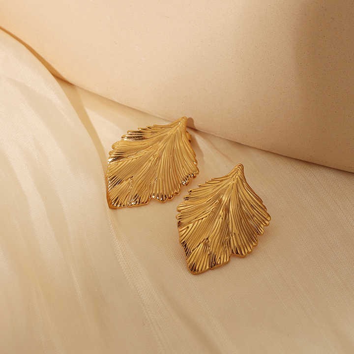 Lumora Golden Leaf Textured Statement Earrings