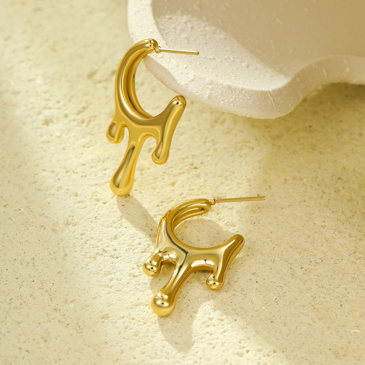 Lumora Golden Fluid Drip Earrings