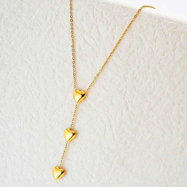 Lumora Golden Triple Heart Drop Necklace