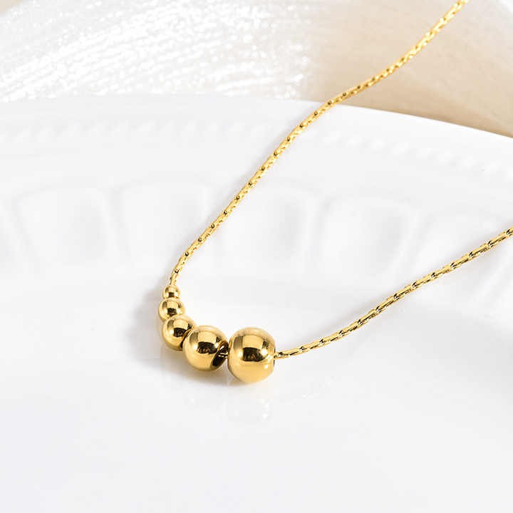 Lumora Golden Bead Cascade Necklace – Modern Minimal Luxe