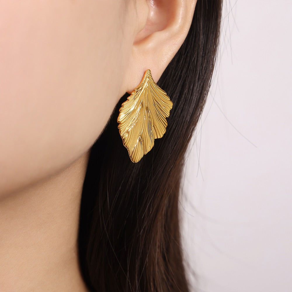 Lumora Golden Leaf Textured Statement Earrings