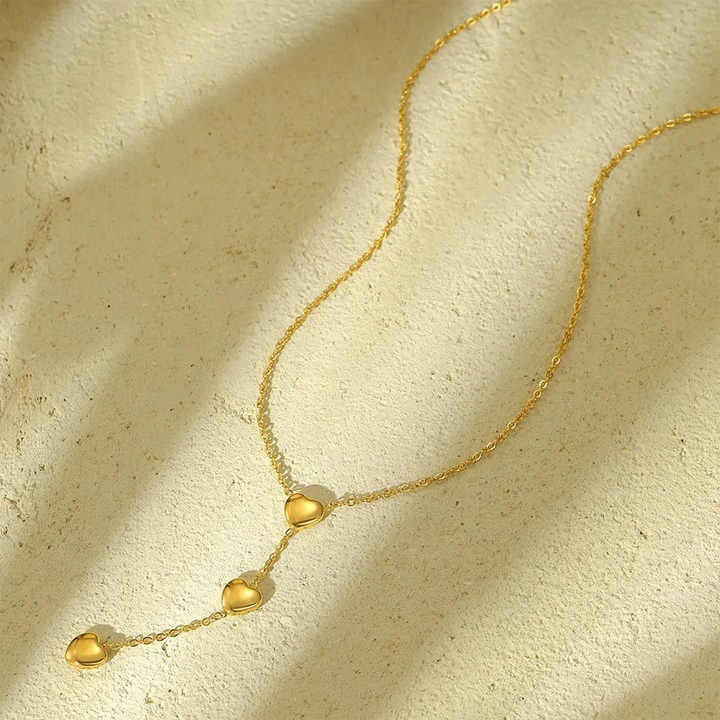 Lumora Golden Triple Heart Drop Necklace