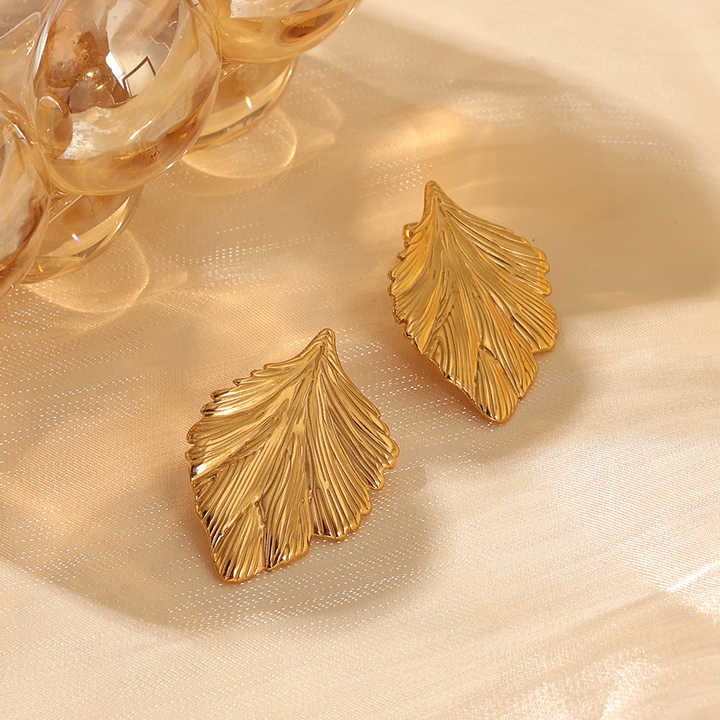 Lumora Golden Leaf Textured Statement Earrings