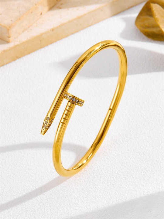 Lumora Gold-Plated Nail Kada with Stone Detailing