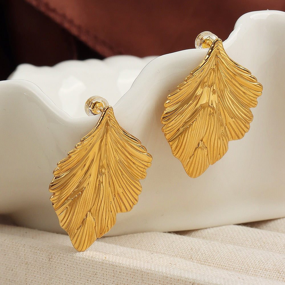 Lumora Golden Leaf Textured Statement Earrings