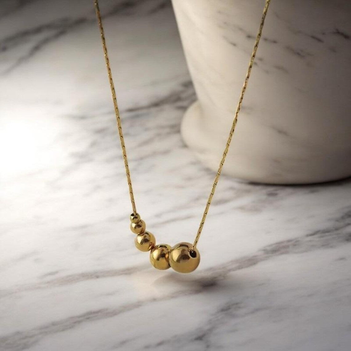 Lumora Golden Bead Cascade Necklace – Modern Minimal Luxe