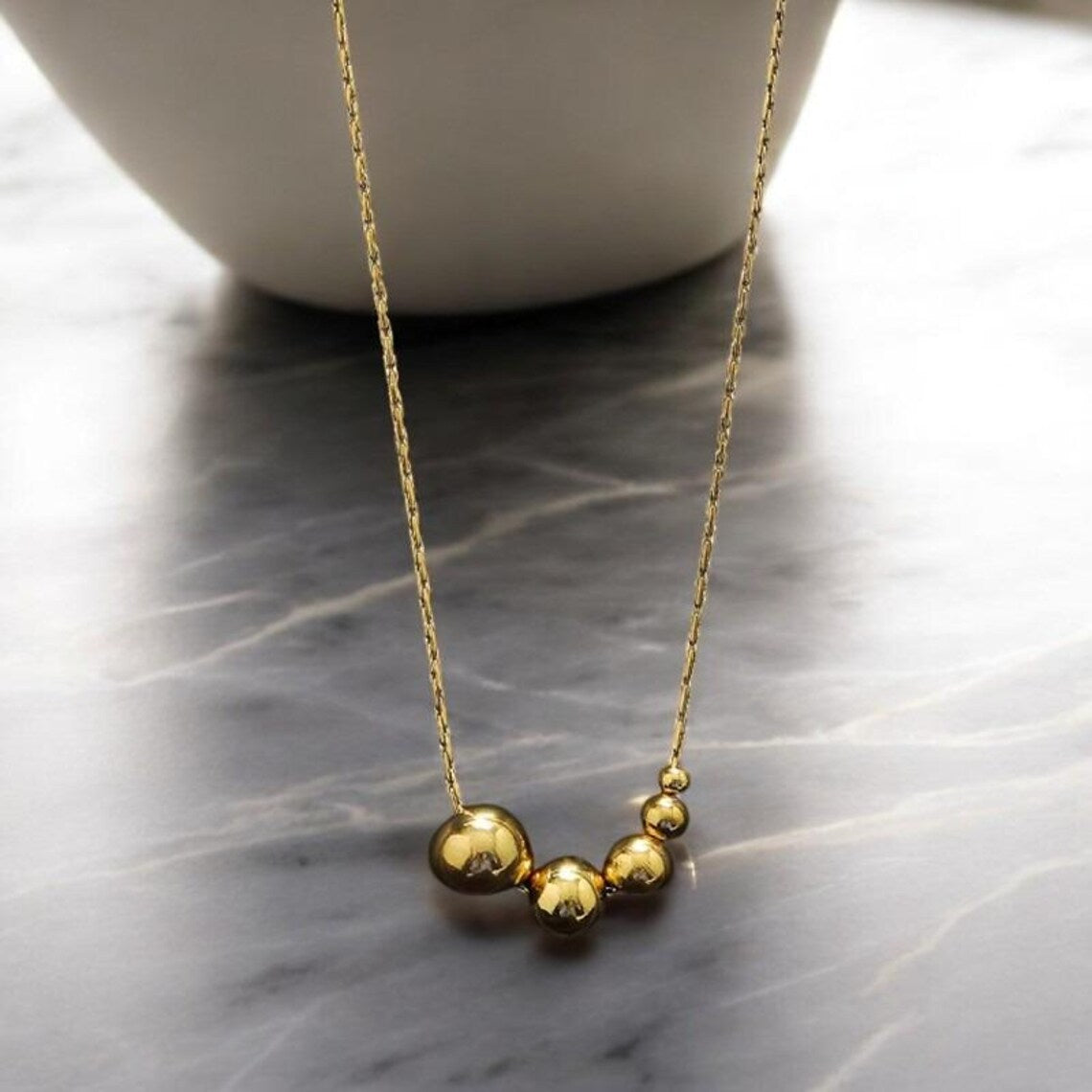 Lumora Golden Bead Cascade Necklace – Modern Minimal Luxe