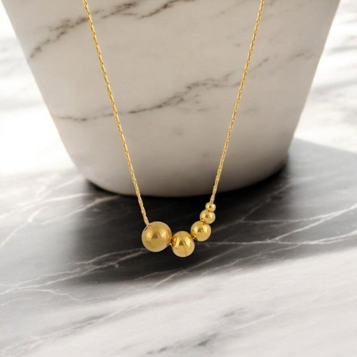 Lumora Golden Bead Cascade Necklace – Modern Minimal Luxe